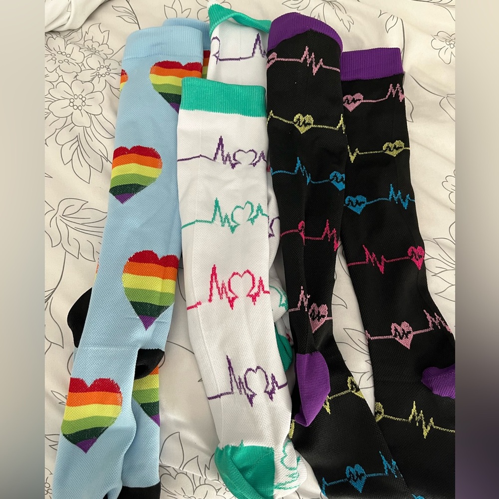Lot of 3- patterned compression socks. Never worn!